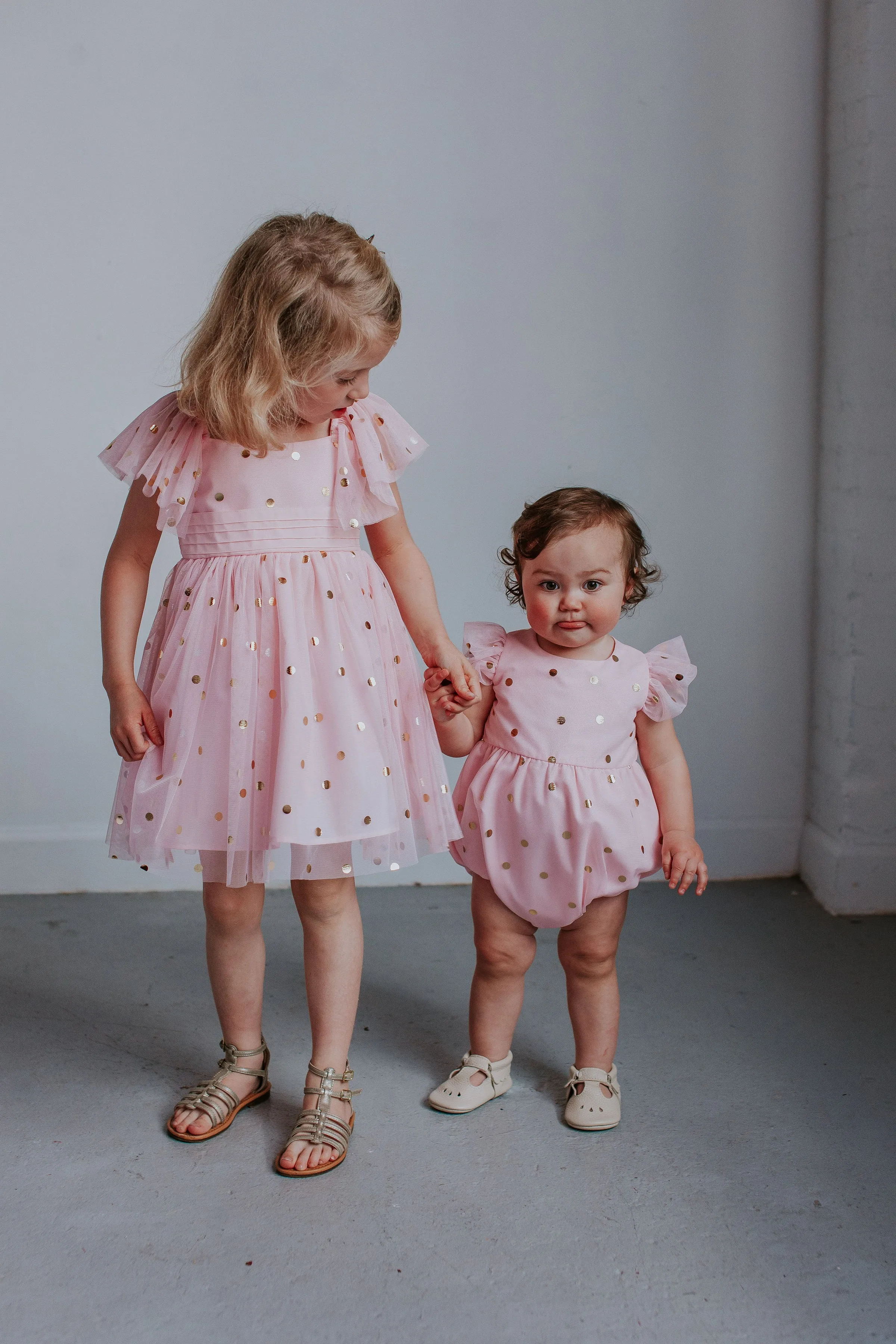 Little Girl's Pink Tulle Dress with Gold Polka Dots