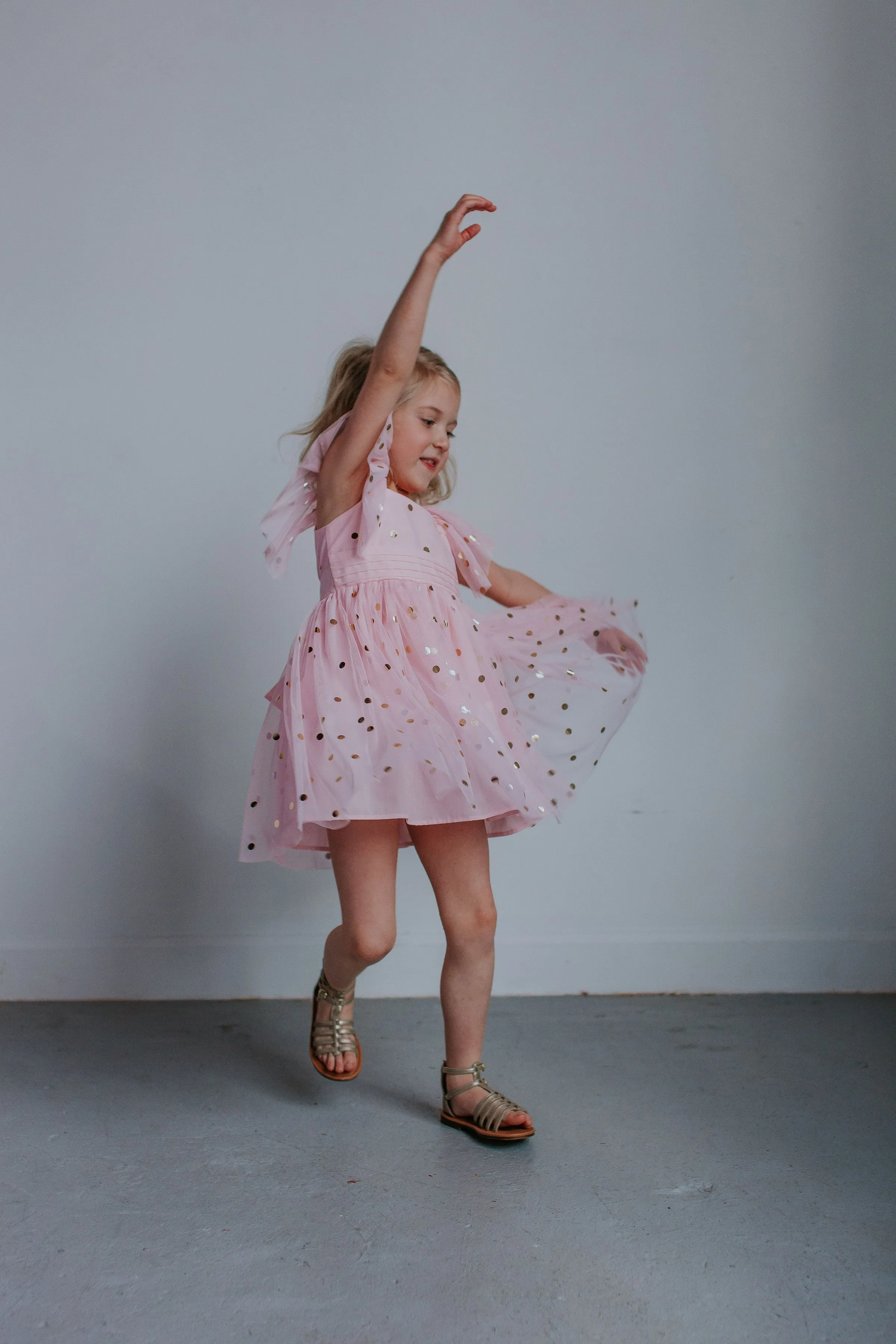 Little Girl's Pink Tulle Dress with Gold Polka Dots