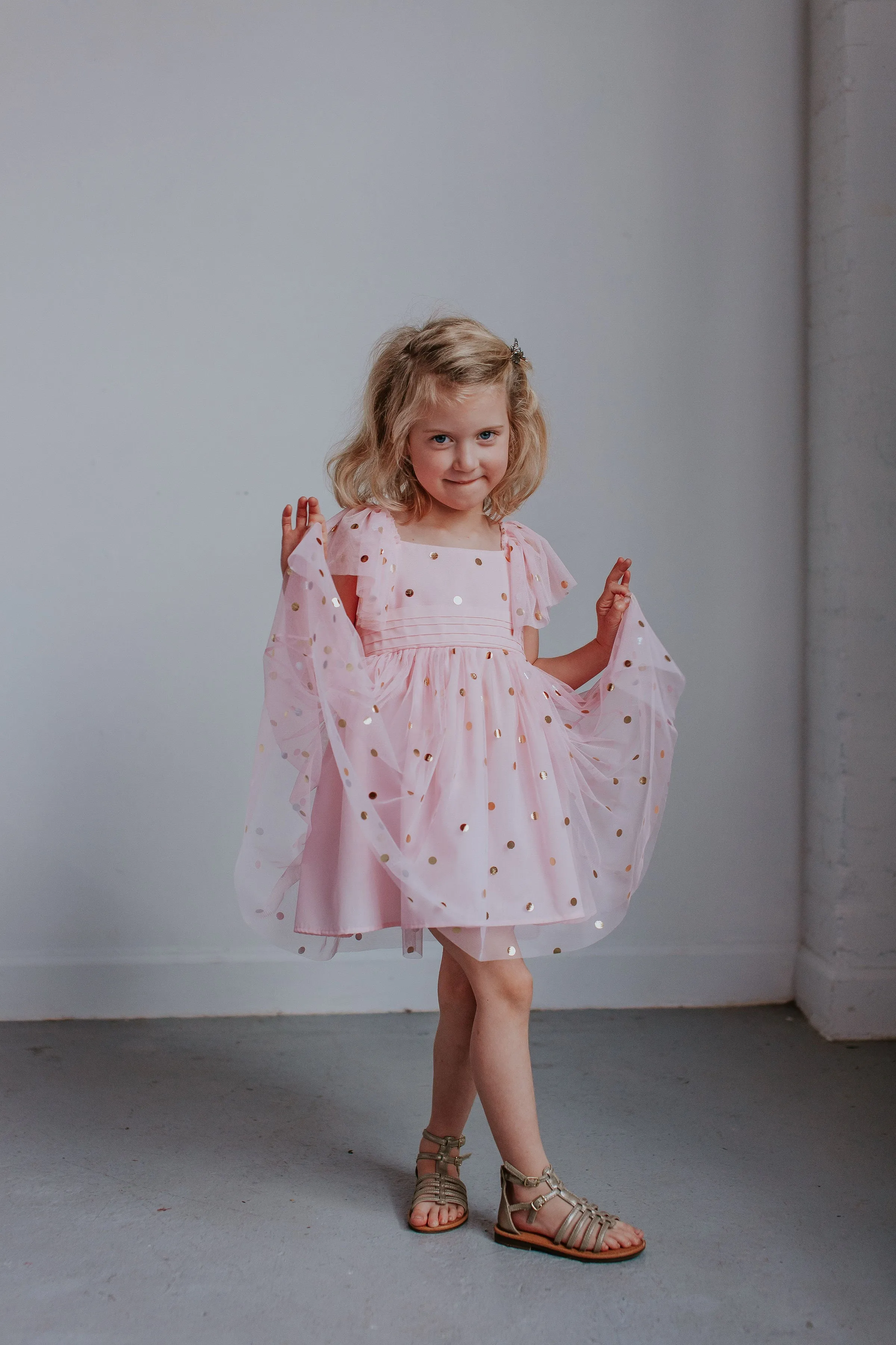 Little Girl's Pink Tulle Dress with Gold Polka Dots